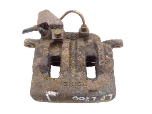 ZACISK HAMULCOWY LEWY PRZÓD MITSUBISHI L200 2.5 TD - przód