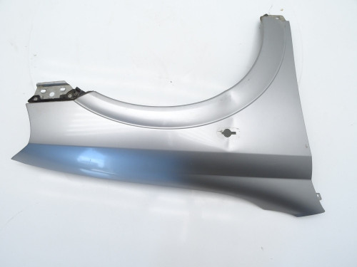 BŁOTNIK PRAWY PRZÓD SREBRNY Opel Astra II G 1.6 | Oryginalne Części Używane | PARTLE.COM - zdjęcie 7 z 12