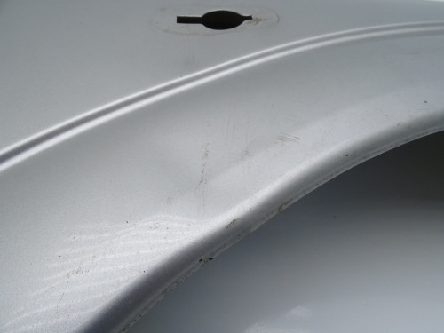 BŁOTNIK PRAWY PRZÓD SREBRNY Opel Astra II G 1.6 | Oryginalne Części Używane | PARTLE.COM - zdjęcie 12 z 12